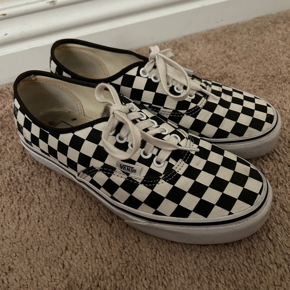 Checkered black and cream lace up vans